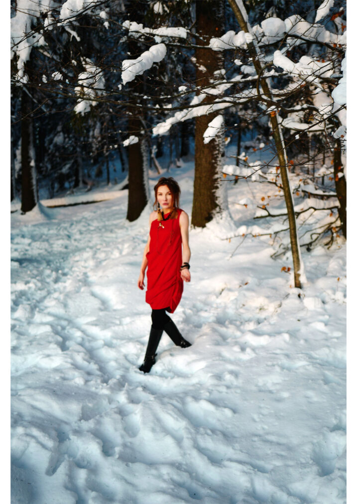 martha may red cocktail dress in winter forest norway